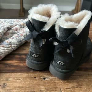 Black sparkle uggs with one bow